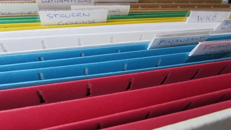 Hanging file folders with handwritten tabs