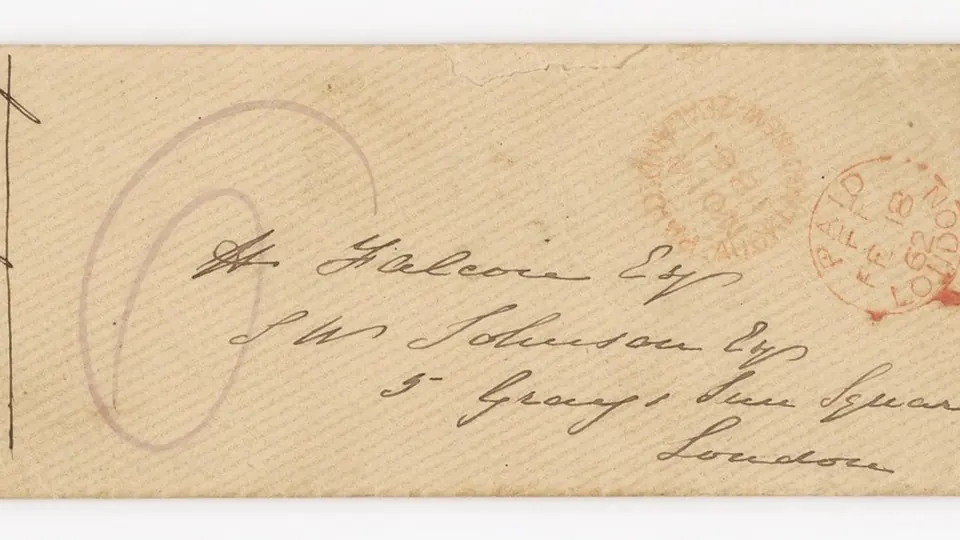 Old posted envelope with a handwritten address