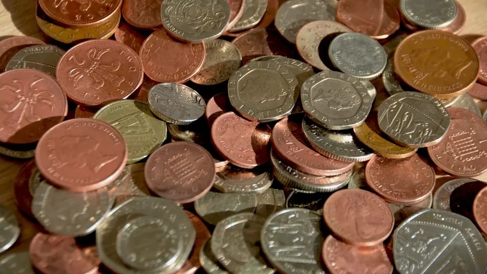 Pile of British pence coins